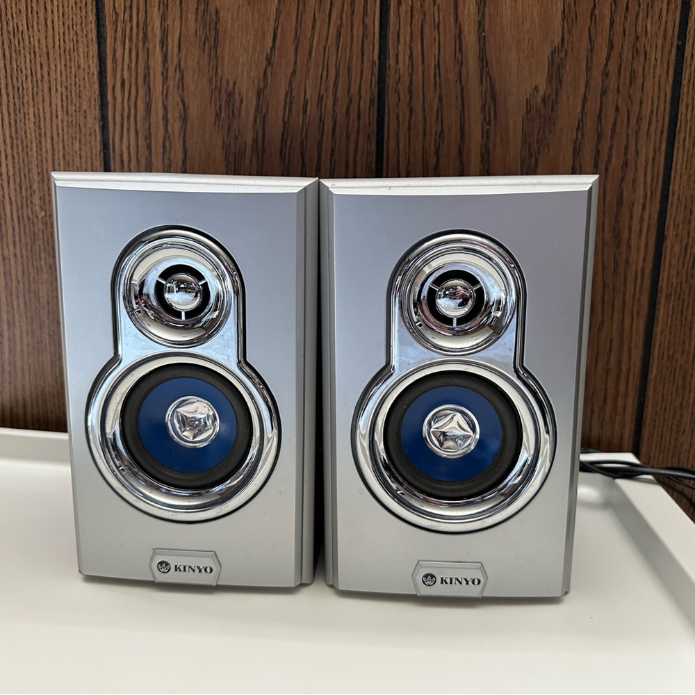 2 Silver and Blue Speakers